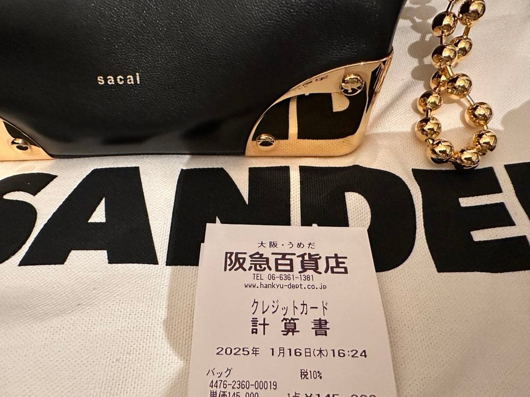 Sacai コーナーメタルクラッチ