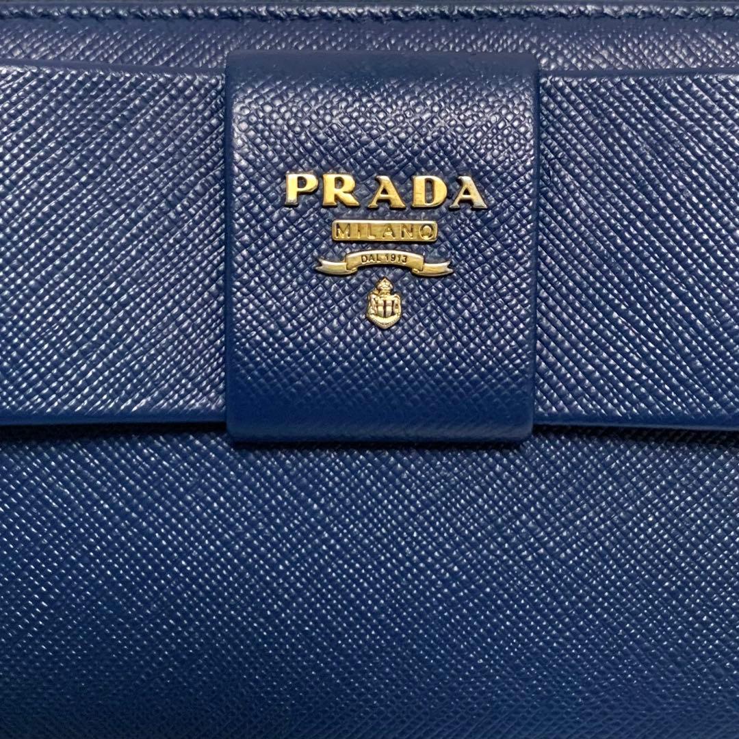 美品　PRADA 長財布　サフィアーノ　リボン　ラウンドジップ　ネイビー