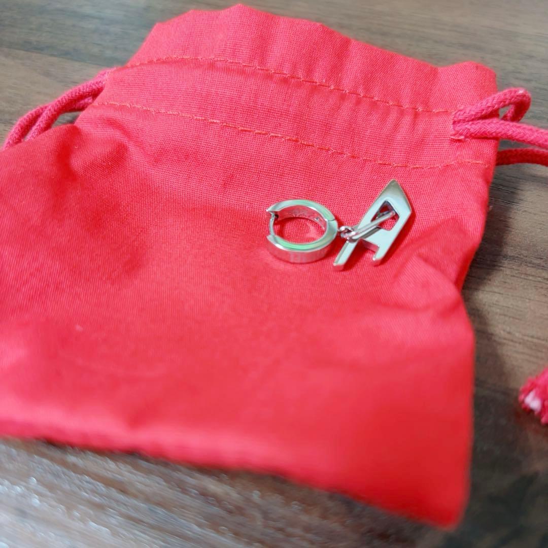 DIESEL シルバー ピアス(片耳用) 赤いポーチ付き