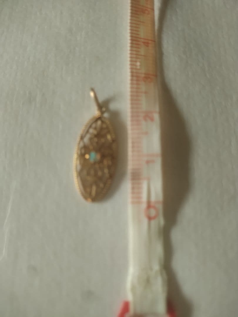 agete オーバル型透かしデザインチャーム