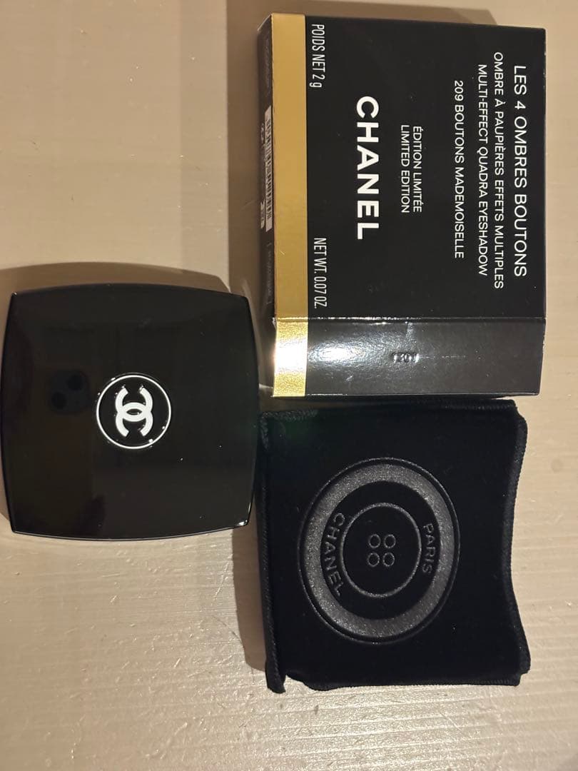 レ キャトル オンブル ブトン　209