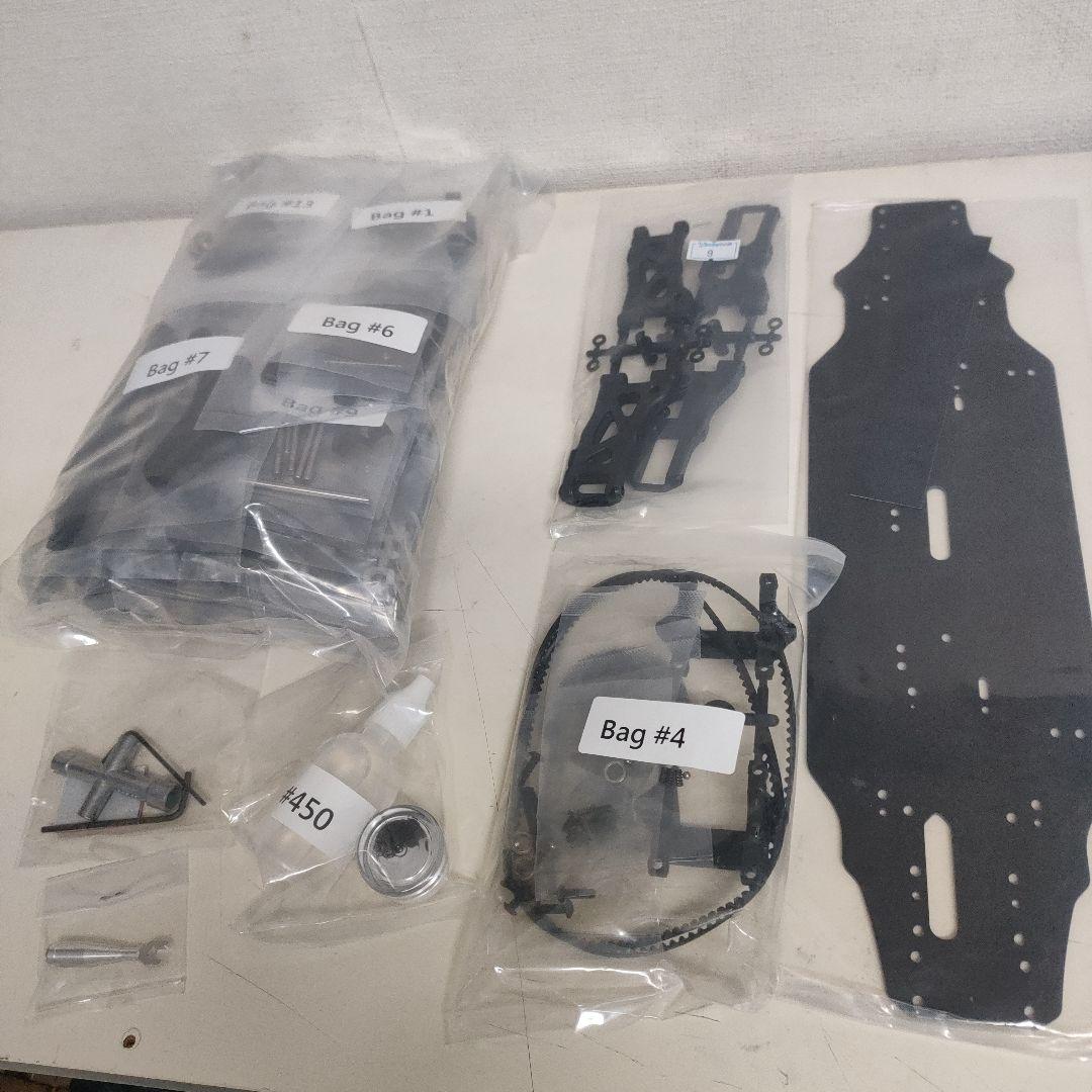 【未組立て】ヨコモ RS1.0シャーシ、未塗装ボディ、新品スペア部品付き