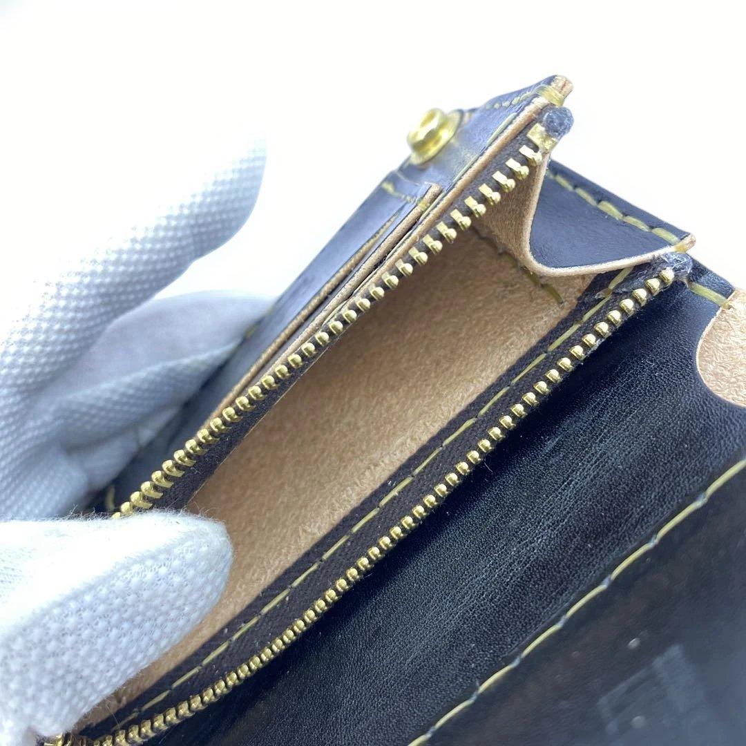 折らずお札収納 丘染めブラックの無骨トラッカーウォレット マチ 引手 小判かん