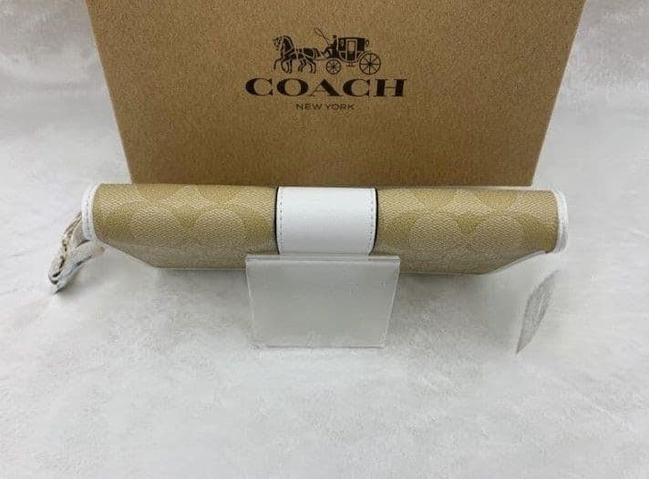 新品未使用コーチ長財布ベージュシグネチャーレディースメンズ送料無料即日発送