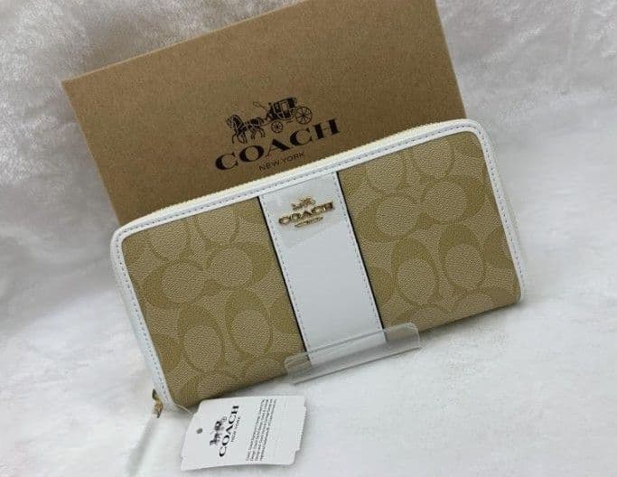 新品未使用コーチ長財布ベージュシグネチャーレディースメンズ送料無料即日発送