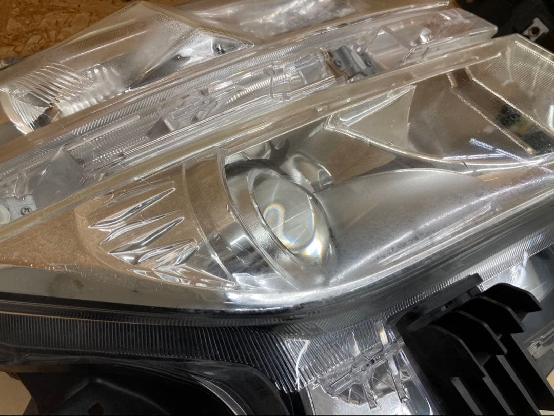 エルグランド 左右純正ヘッドライトPNE52前期 バラスト付き100-23009