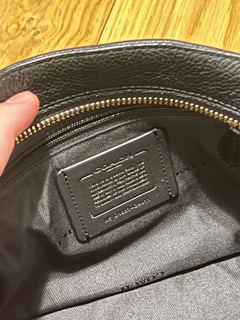 【未使用品】COACH タッセルブラックレザーバッグ