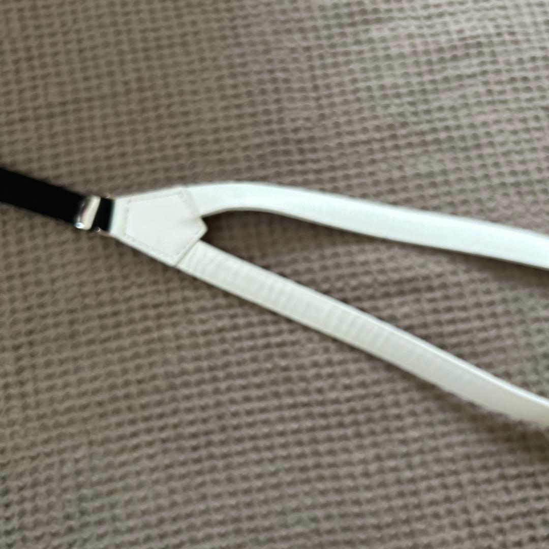 【TOGA PULLA(トーガプルラ)】コンチョサスペンダー