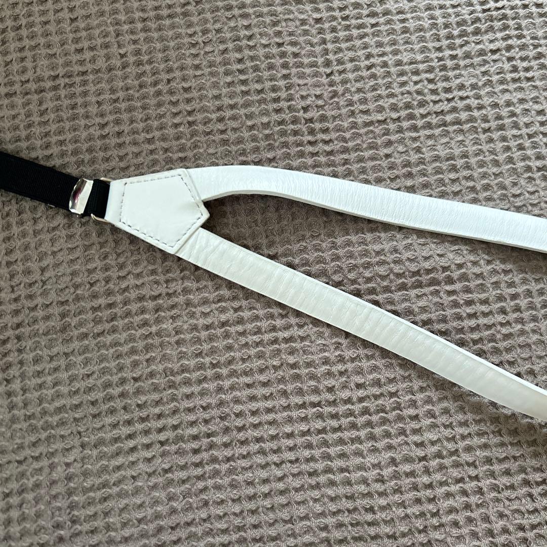 【TOGA PULLA(トーガプルラ)】コンチョサスペンダー