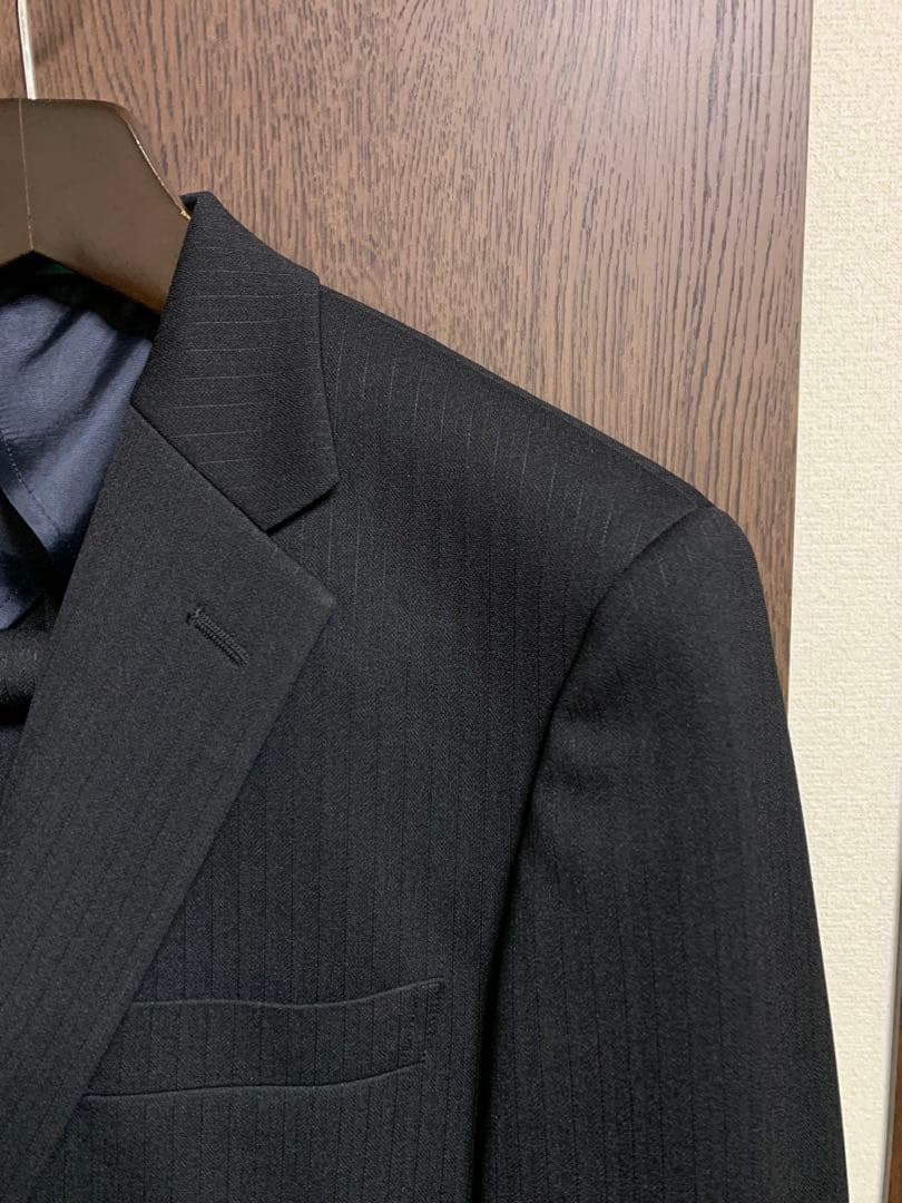 A6新品未使用！着心地抜群ストレッチビジネススーツ！ウォッシャブル無地調ブラック