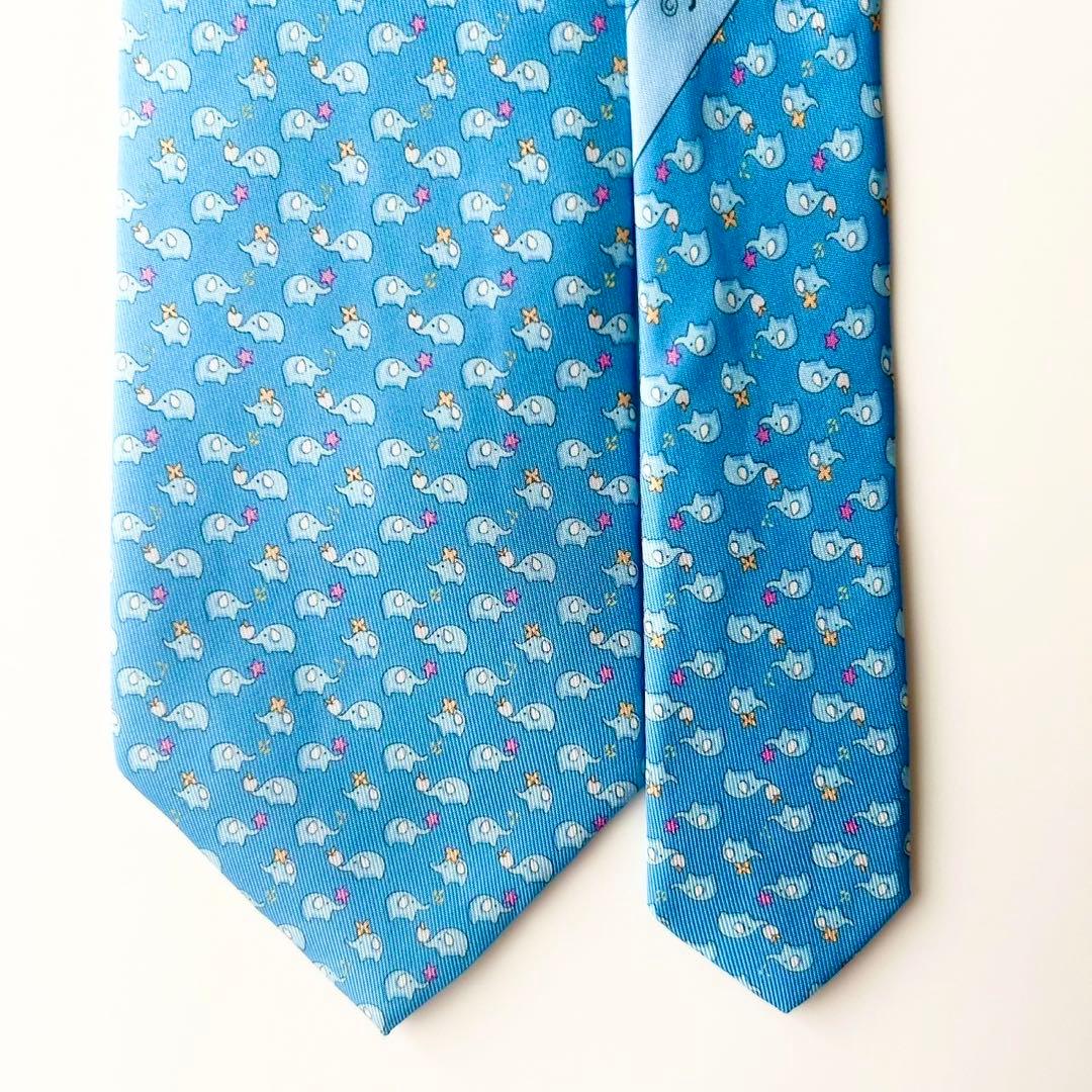 【未使用】フェラガモ シルクネクタイ 小象モチーフゾウ柄総柄 ライトブルー