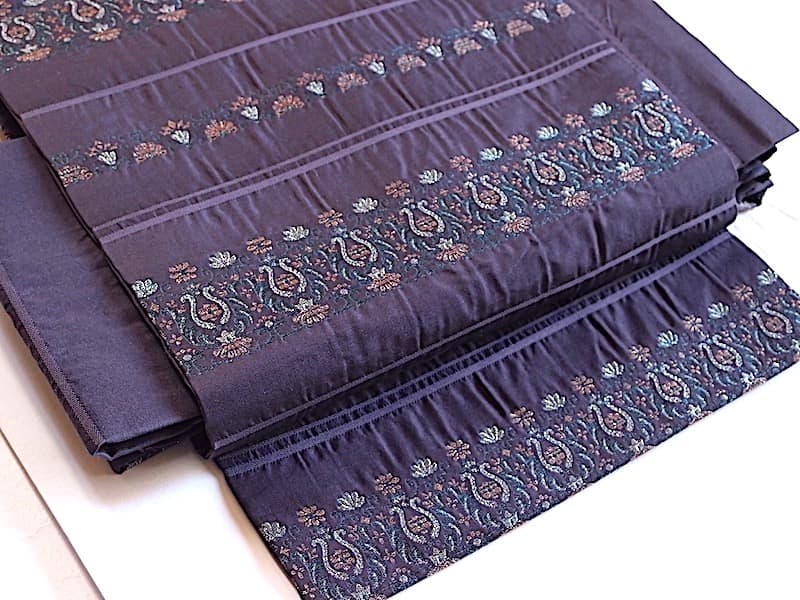 変わり織り九寸名古屋帯（横段に抽象文）正絹美品