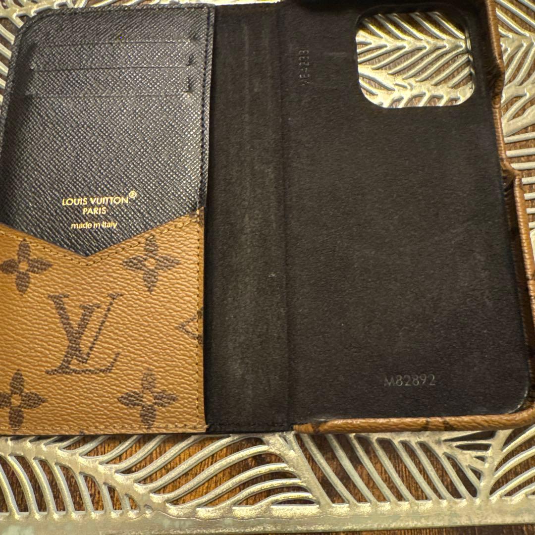 LOUISVUITTON iPhon15PROフォリオ モノグラム リバース
