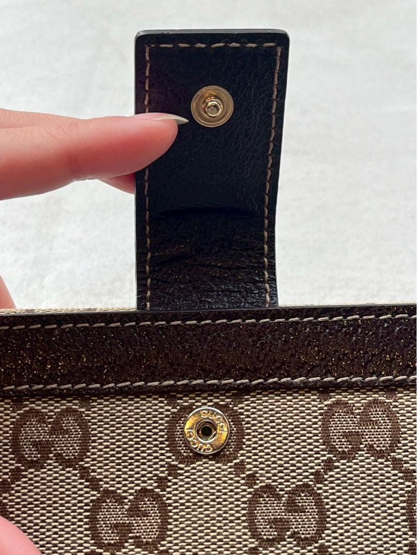【新品未使用】グッチ 長財布 GGキャンバス ボルト スタッズ　定価56700円