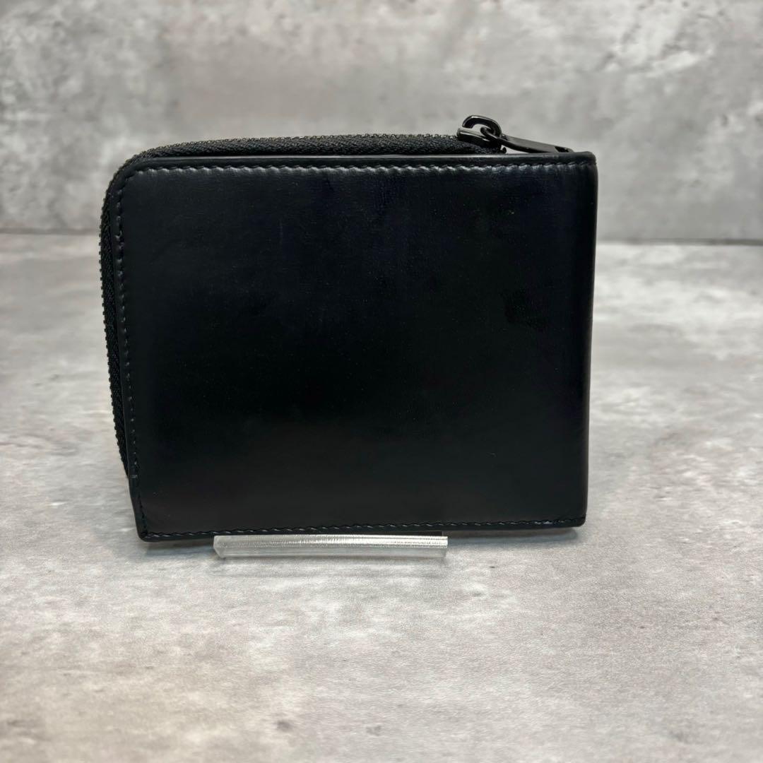 極美品✨サンローラン 二つ折り財布 ラウンドジップ カサンドラ ブラックロゴ 黒