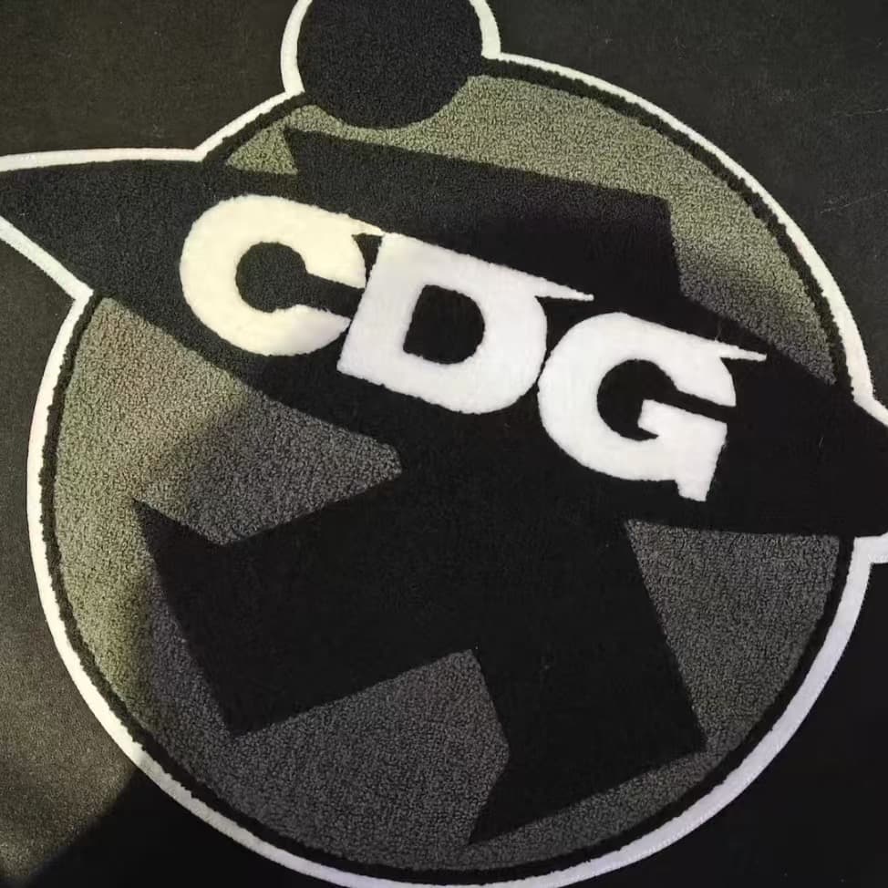 STUSSY x コム・デ・ギャルソン スタジャン ジャケット