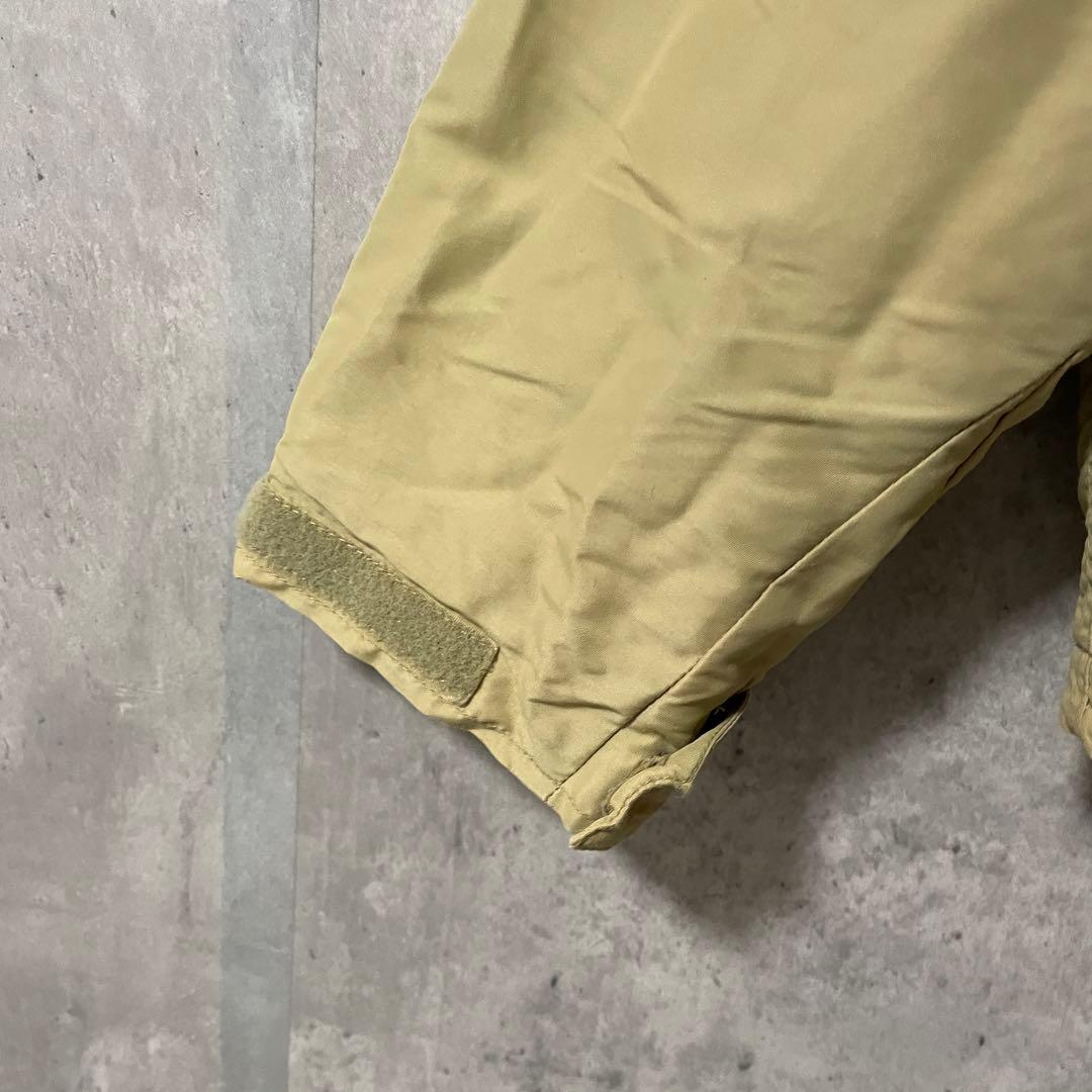 Burtonバートンスキーウェアスノーボードジャケットブルゾンベージュ刺繍ロゴ