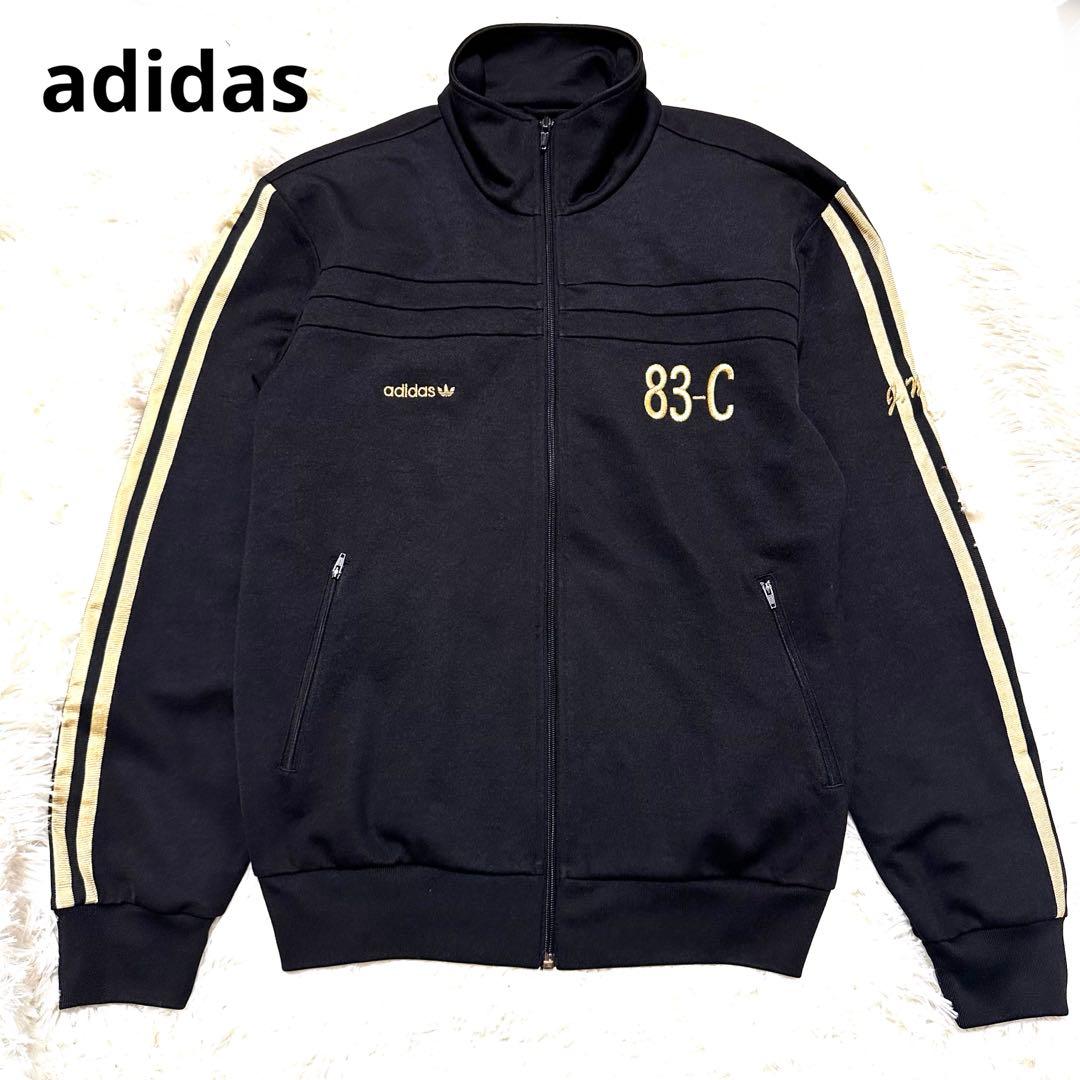 アディダス トレフォイル ロゴ刺繍 トラックジャケット ブラック 黒 金色