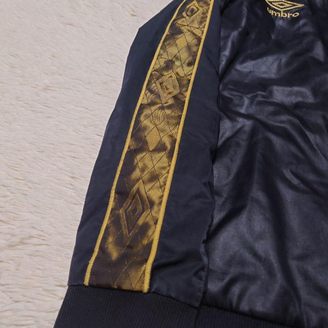 くり UMBRO アンブロ 中綿セットアップ ジャージ ブラック×ゴールド