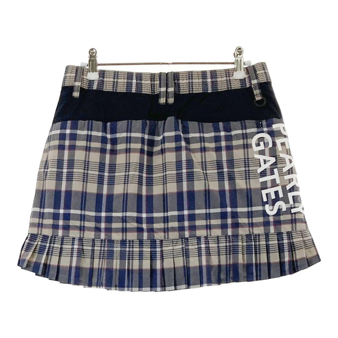 パーリーゲイツ 【軽量保温】バックロゴプリーツ切替タフタスカートサイズ0