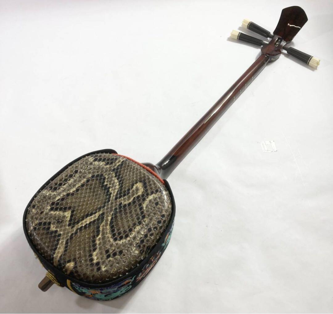 縞黒檀/カマゴン棹 強化張り・蛇皮三線