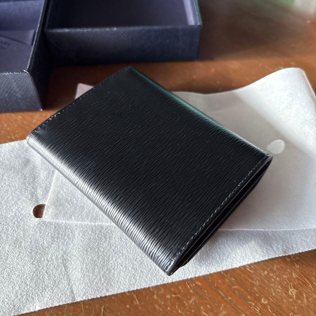 【新品】PRADA 三つ折財布 黒 赤 メンズ エピレザー