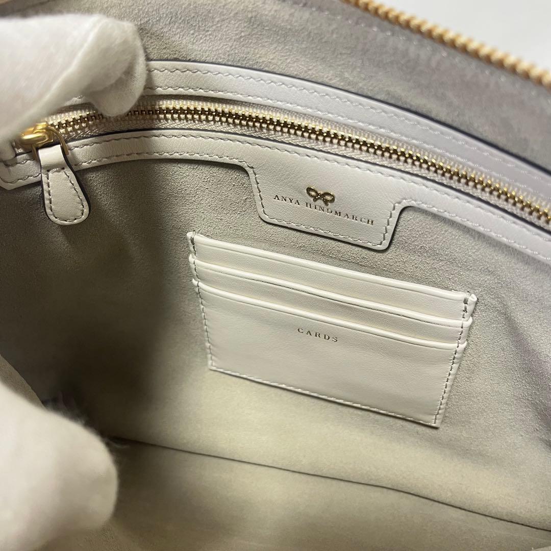 ANYA HINDMARCH ステッカーデザイン クラッチバッグ　フリンジ