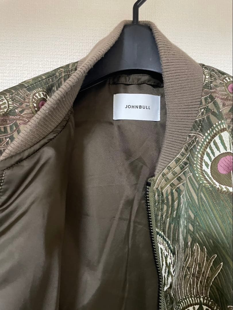 ジョンブル　MA-1 孔雀羽柄ブルゾン