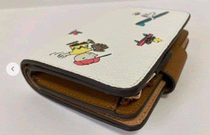 新品未使用コーチ二つ折り財布COACH×PEANUTSスヌーピーホワイト送料無料