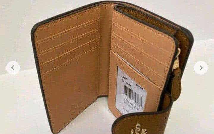 新品未使用コーチ二つ折り財布COACH×PEANUTSスヌーピーホワイト送料無料