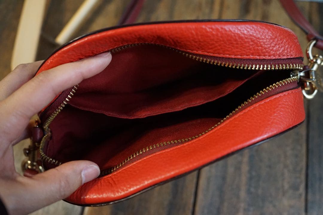 coach赤とオレンジバイカラーオーバルポシェット