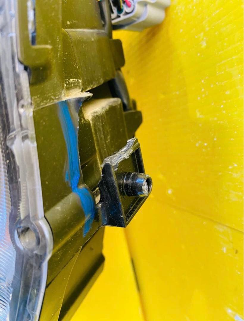 スズキラパンHE33S 左ヘッドライトICHIKOHA021