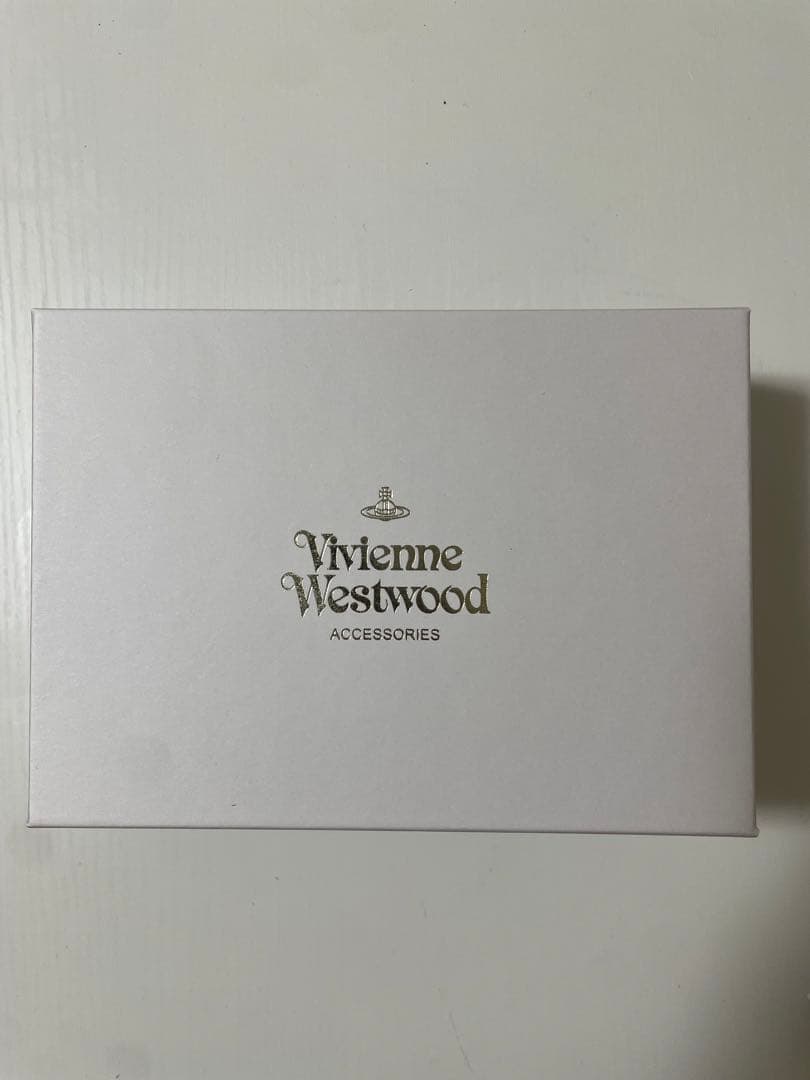 ヴィヴィアンウェストウッド　ピンク レザー 三つ折り財布 メタルロゴ