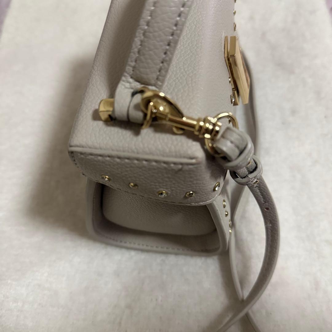 セルフォード リュタンビジュースタッズポシェット GBEG