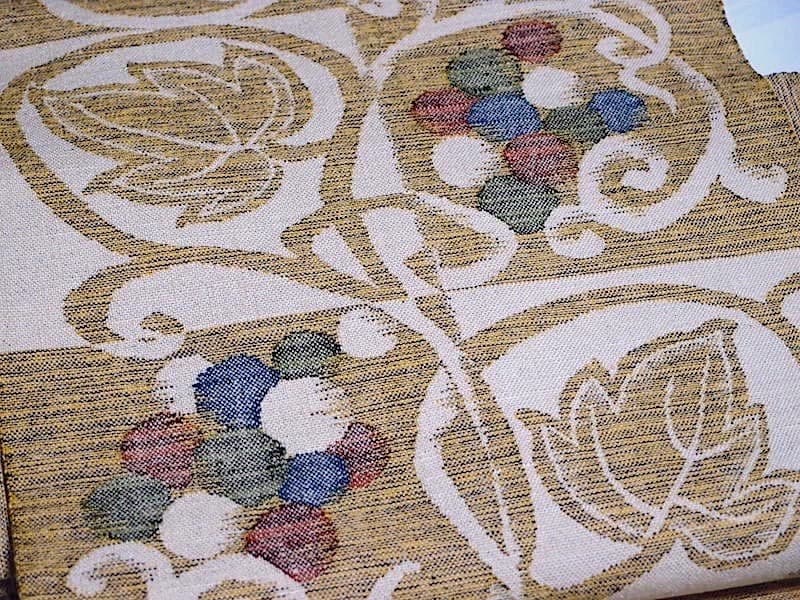 西陣織　紬八寸名古屋帯（市松に葡萄葉文）長366　三幸織物　正絹美品