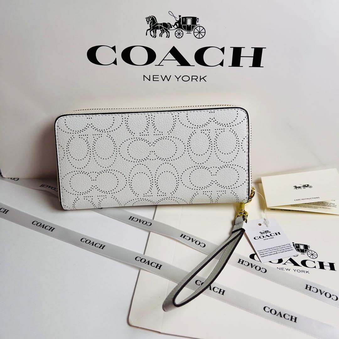 新品未使用COACHコーチ長財布 ホワイト パンチングロゴ ストラップ付 ギフト