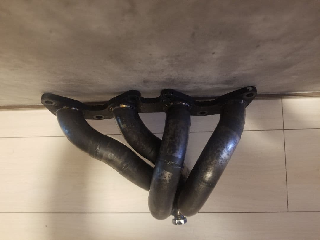 日産 パオ pk 10 エキゾーストマニホールド used