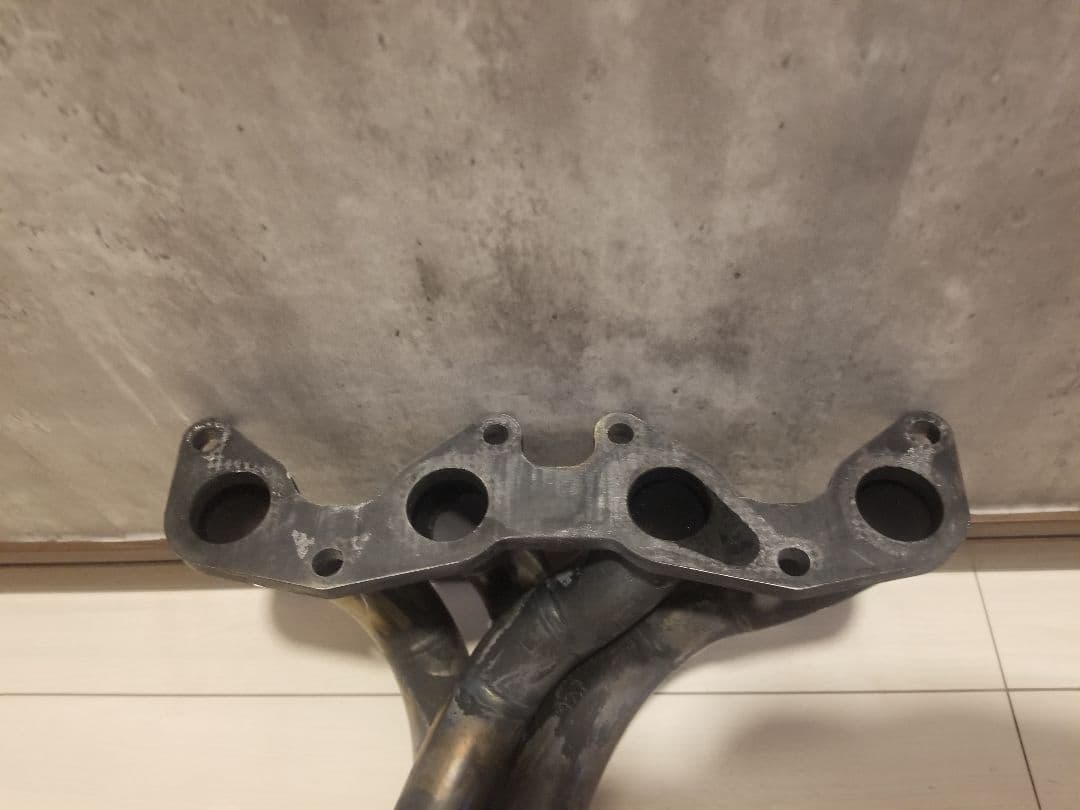 日産 パオ pk 10 エキゾーストマニホールド used