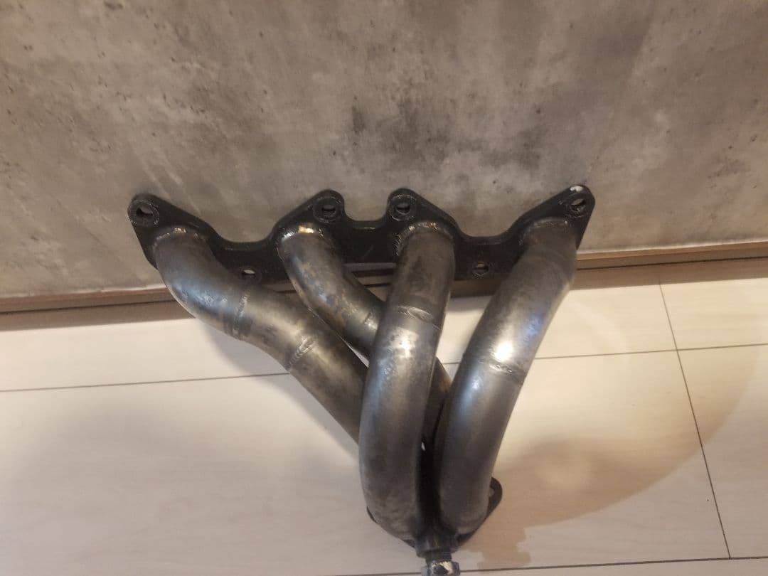 日産 パオ pk 10 エキゾーストマニホールド used