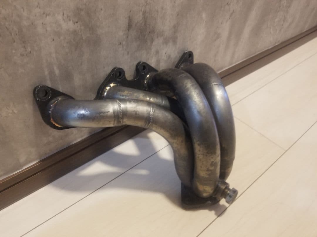 日産 パオ pk 10 エキゾーストマニホールド used