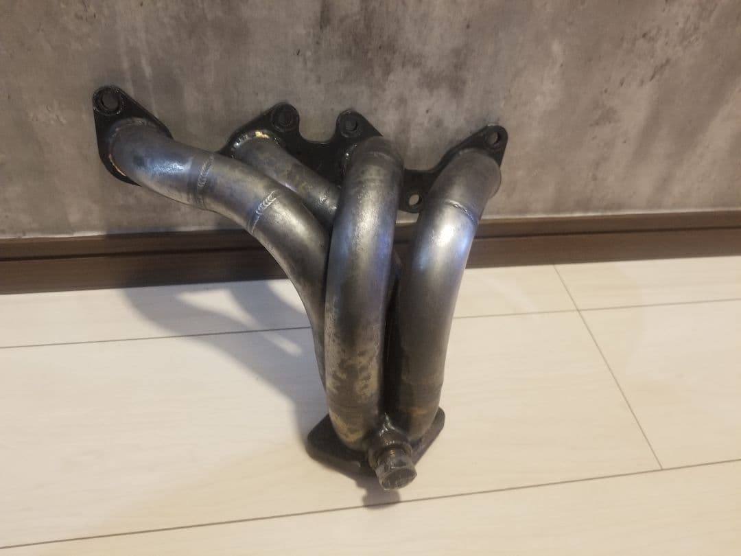 日産 パオ pk 10 エキゾーストマニホールド used