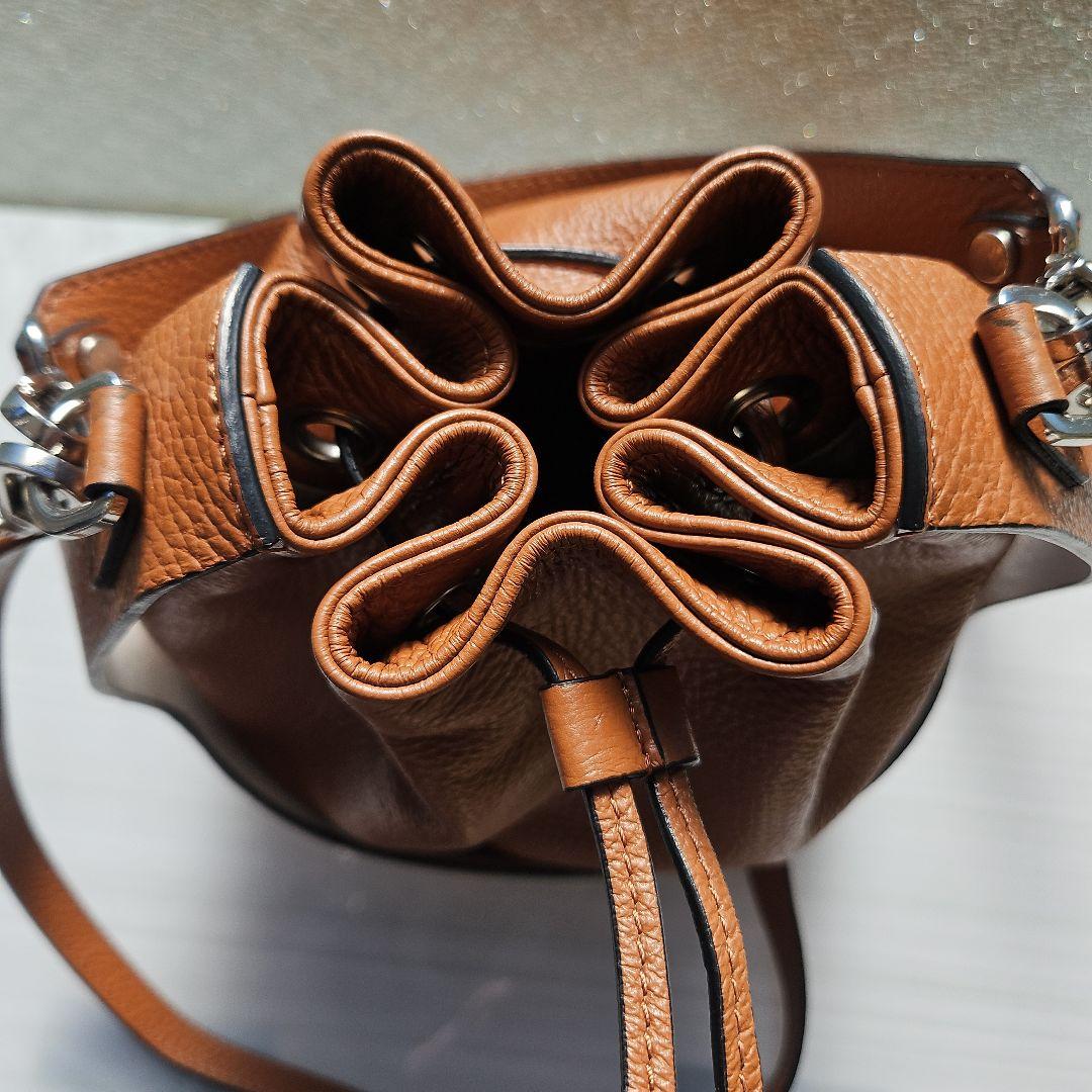 オーロラプレステージ シュリンクレザー巾着バッグ茶AURORA PRESTIGE