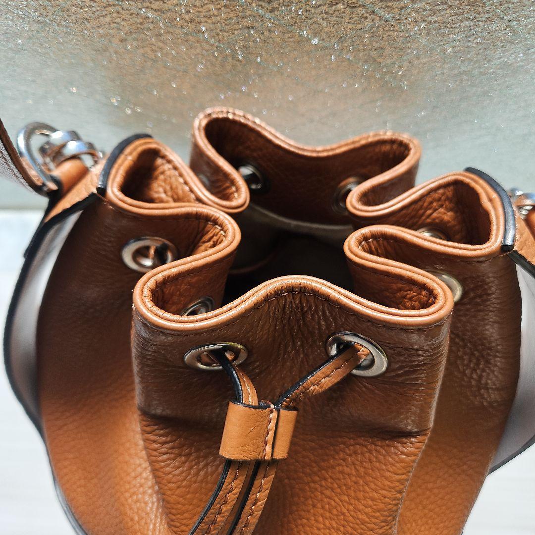 オーロラプレステージ シュリンクレザー巾着バッグ茶AURORA PRESTIGE