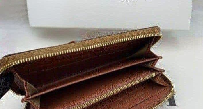 新品未使用コーチ長財布スヌーピー柄ストラップブラウンレディースメンズ送料無料