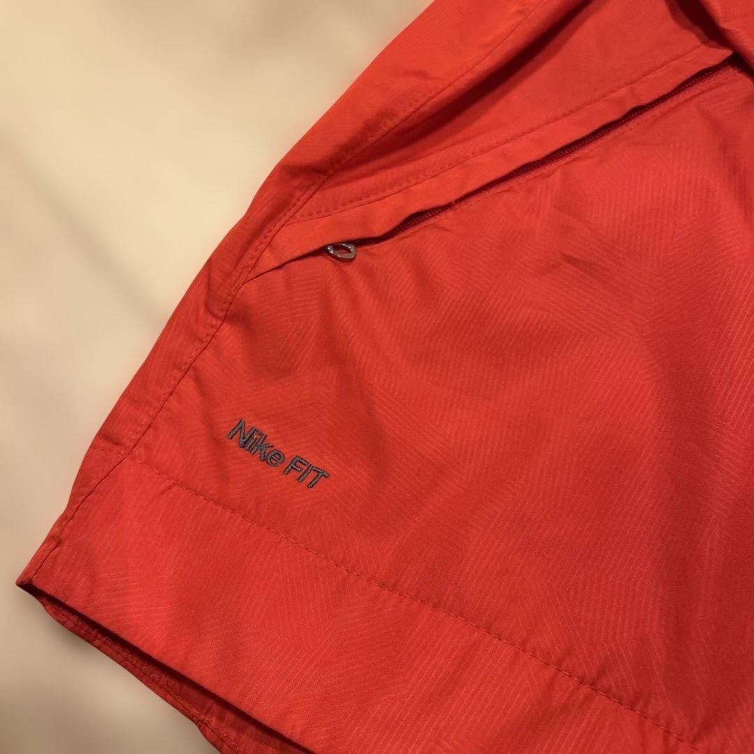 Nike マンチェスター・ユナイテッド ウィンドブレーカー オレンジ