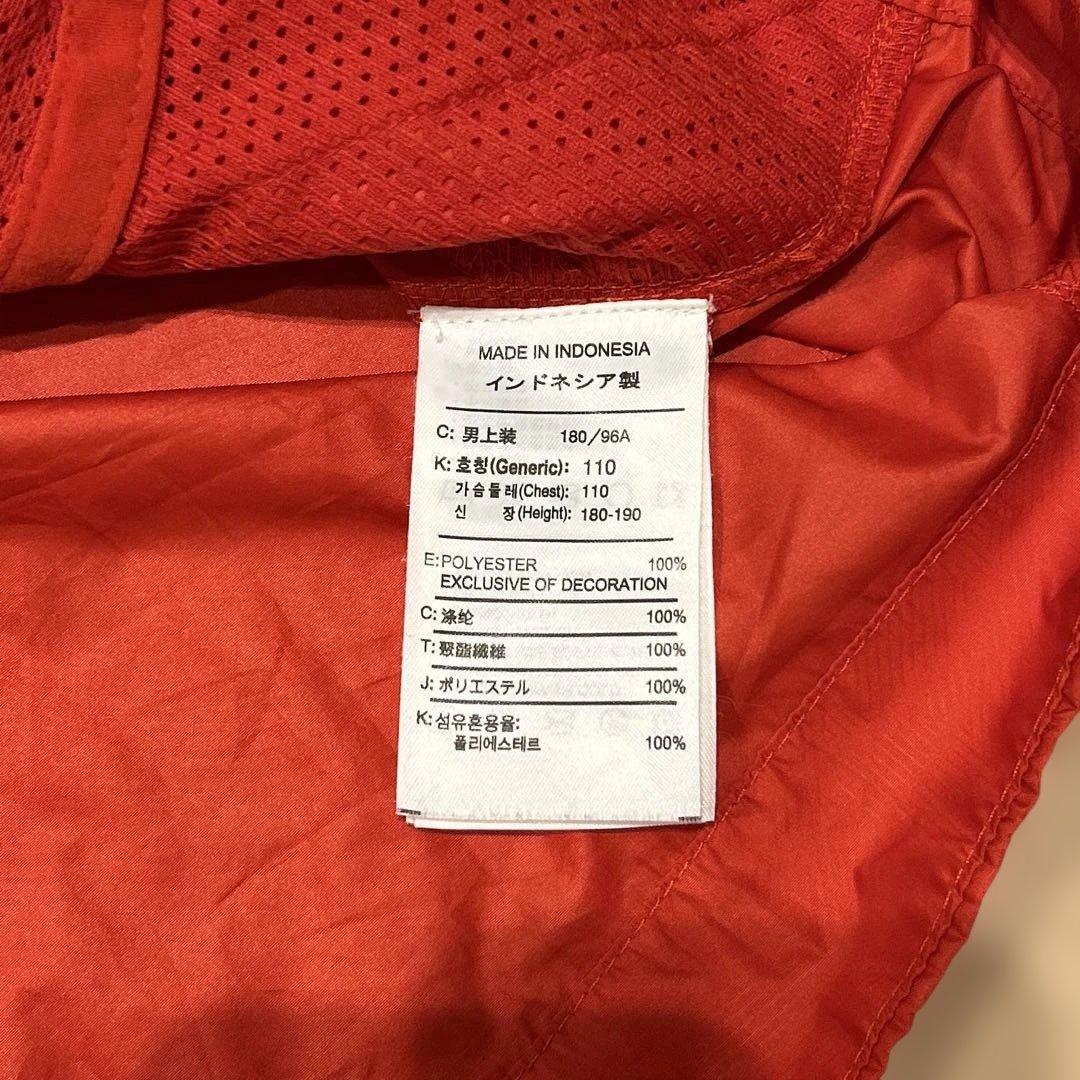 Nike マンチェスター・ユナイテッド ウィンドブレーカー オレンジ