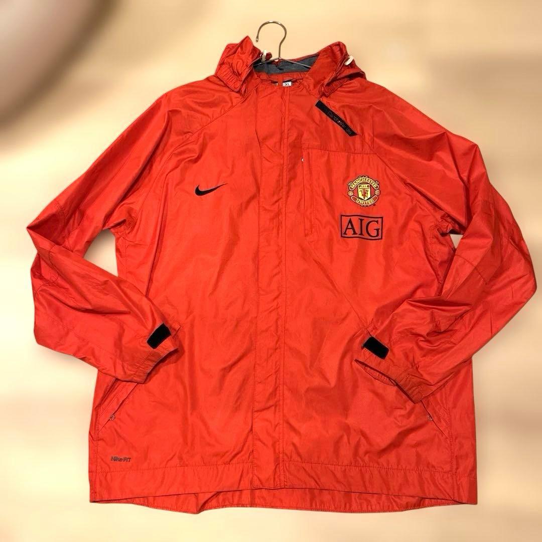 Nike マンチェスター・ユナイテッド ウィンドブレーカー オレンジ