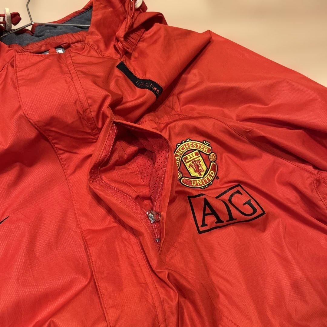 Nike マンチェスター・ユナイテッド ウィンドブレーカー オレンジ