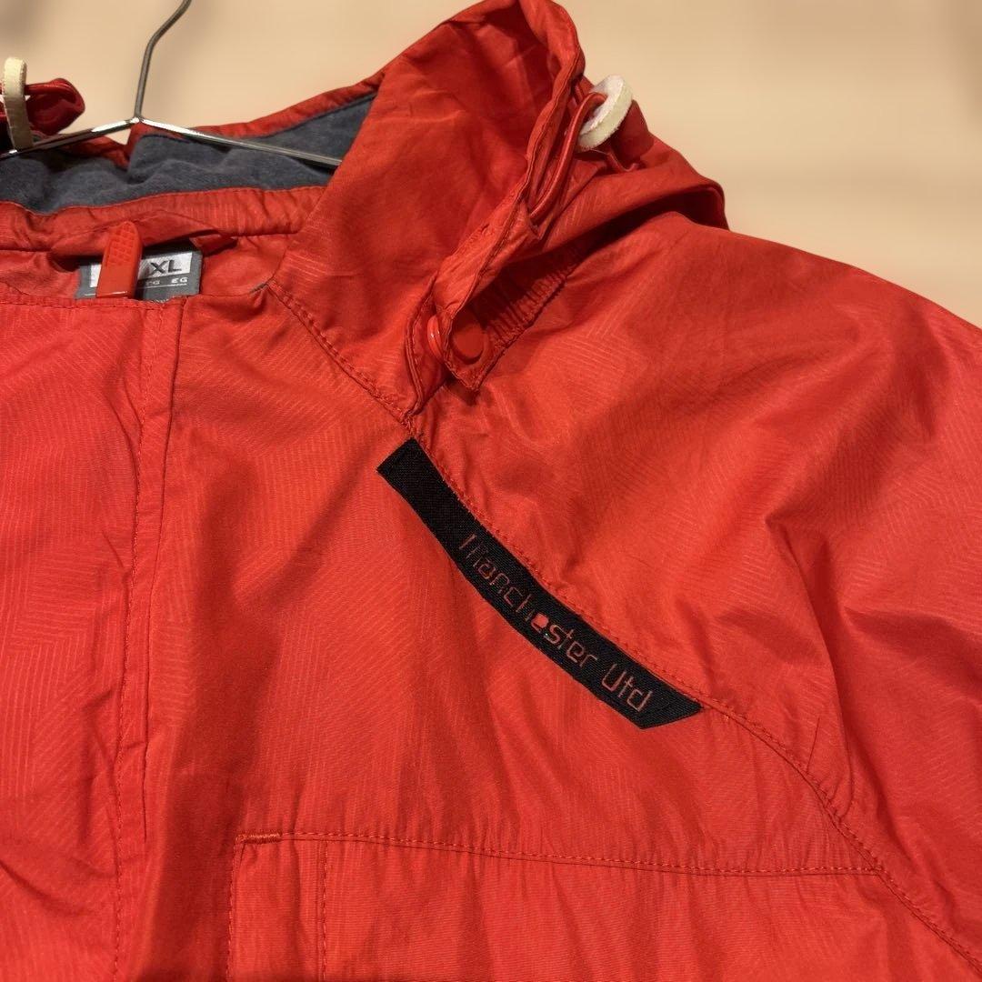 Nike マンチェスター・ユナイテッド ウィンドブレーカー オレンジ