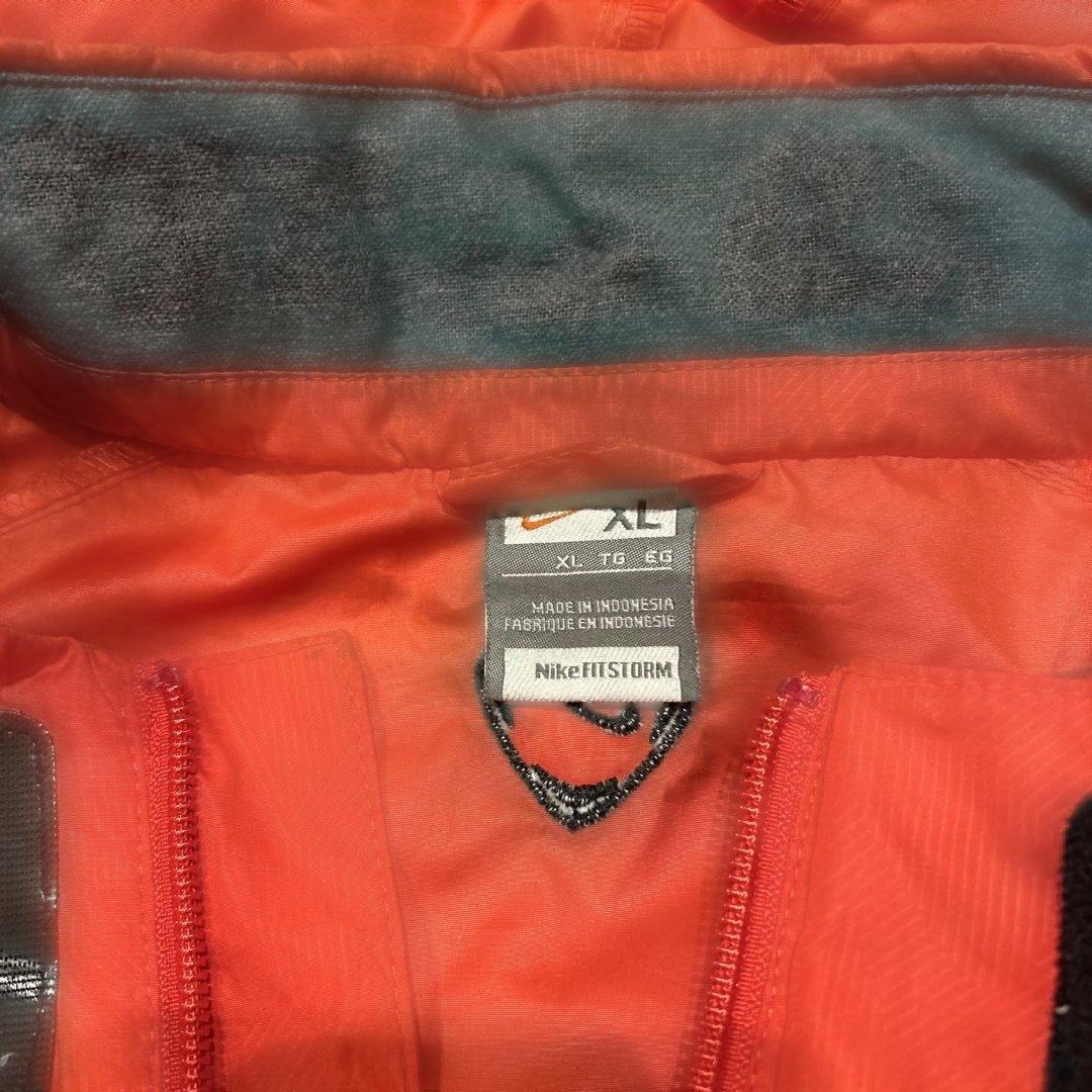 Nike マンチェスター・ユナイテッド ウィンドブレーカー オレンジ